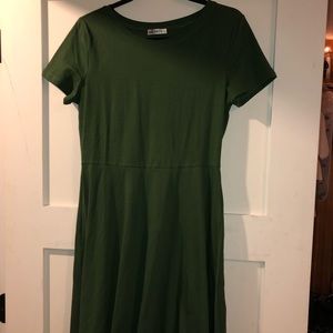 Dark green dress.